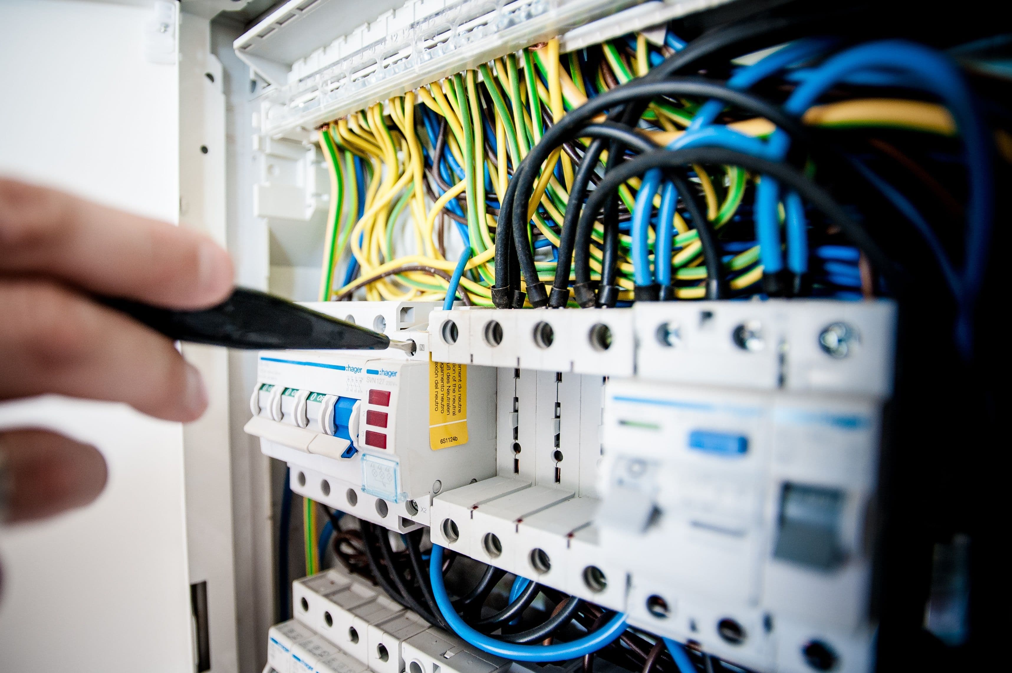 Electrician working on a switchboard